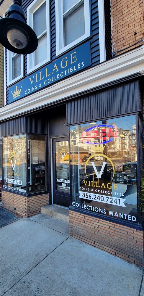Village Coins & Collectibles Logo
