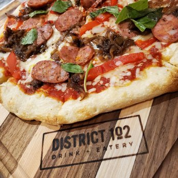 District 102 - Meuwlys sausage pizza for $18 - Canadian (New) Near Me - Edmonton, Alberta
