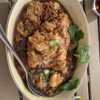 Yau's Place - a bowl of food with a spoon - Chinese Near Me - Lagrange, Illinois