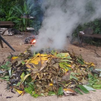 Toa Luau - Fire that is cooking the food (demonstrations) - Cultural Center Near Me - Haleiwa, Hawaii Toa Luau - Fire that is cooking the food (demonstrations) - Cultural Center Near Me - Haleiwa, Hawaii