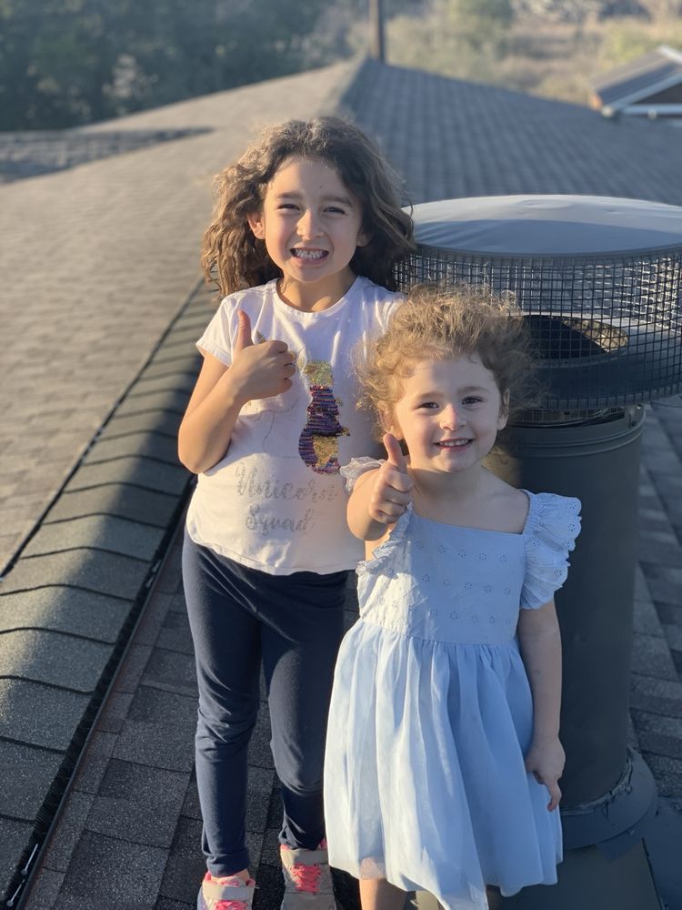 Slide of Freetail Roofing