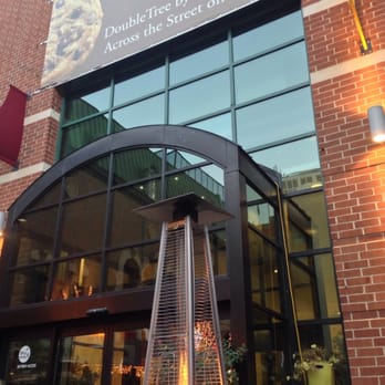 Chester's Kitchen and Bar - Main entrance of the mall which the restaurant is located in. Also depicting the heater that was directly behind my  patio table - New American Near Me - Rochester, Minnesota