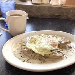 Cup of coffee with the biscuits and gravy. Cup of coffee with the biscuits and gravy.