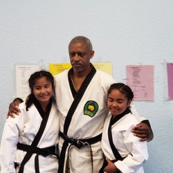 Curtis Sells Martial Arts - Very talented young ladies have now earned their black belts after hours of testing.