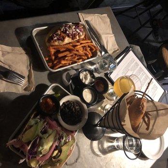 Trinity Brewing - Tacos, jackfruit sandwich, and corn dog. So much vegan deliciousness! - Brewpubs Near Me - Colorado Springs, Colorado Trinity Brewing - Tacos, jackfruit sandwich, and corn dog. So much vegan deliciousness! - Brewpubs Near Me - Colorado Springs, Colorado