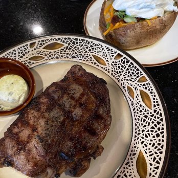 Graysons Steak and Seafood Restaurant - 14oz ribeye and loaded baked potato - Venues & Event Spaces Near Me - Newnan, Georgia