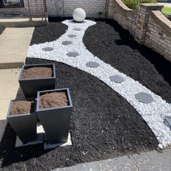 Hicks Lawn And Landscape - Fresh mulch, which they carefully took their time to spread out evenly.