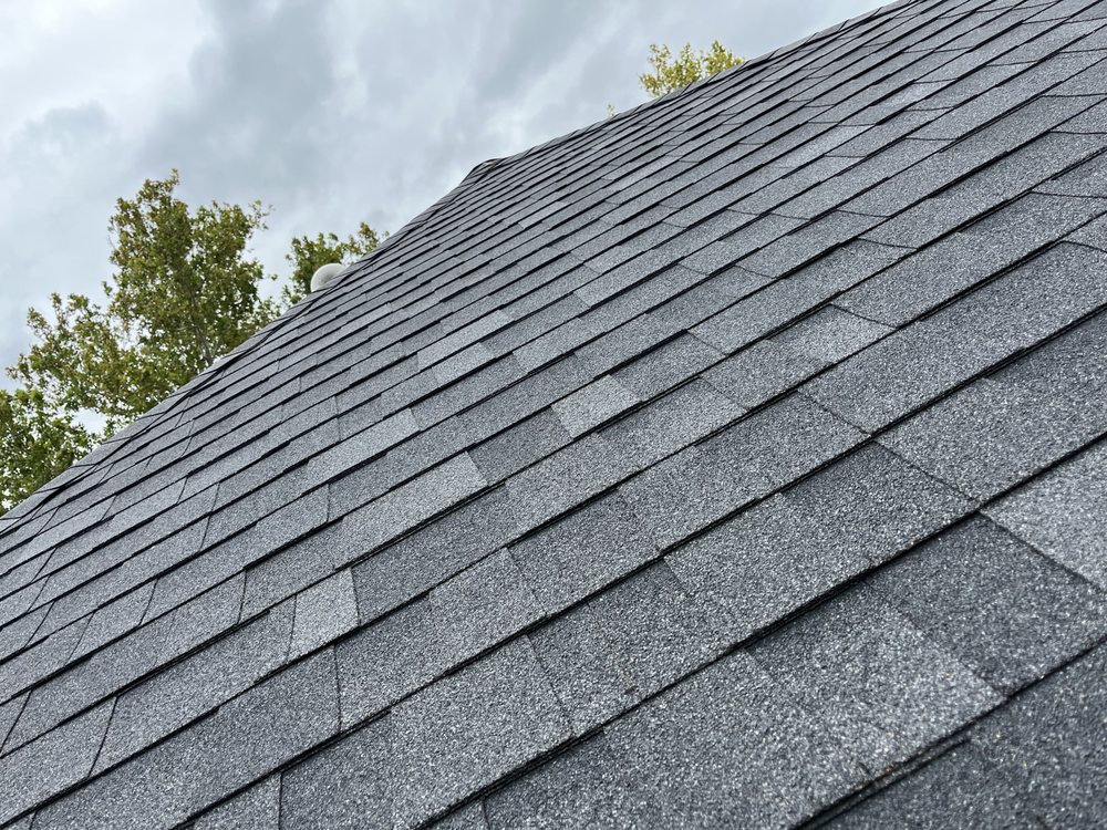 Slide of Rapturous Roofing & Construction