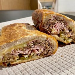 Pullman Market - Cubano sandwich made with homemade mojo pork, prosciutto cotto, Swiss, spicy mustard, and pickles. Huge and delicious!