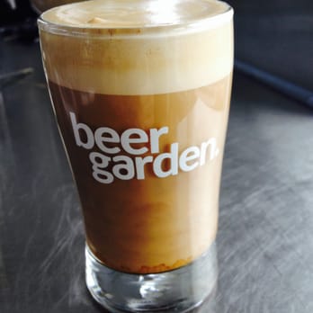 Coffeegarden - a glass of coffee on a table - Coffee & Tea Near Me - Eugene, Oregon
