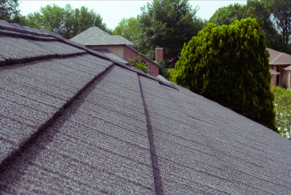 Slide of Veteran Brothers Roofing & Restoration