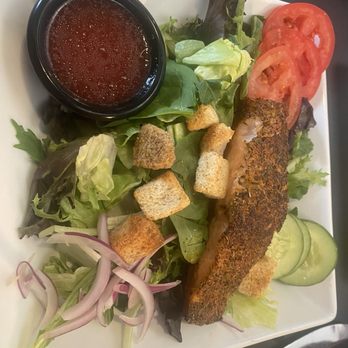 The Bridge - The Bridge salad with blackened salmon. Ooo! - American Near Me - Sidney, Ohio