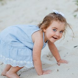 Sarai Ester Photography - A sweet little girl playing in the sand during a Mommy & Me shoot