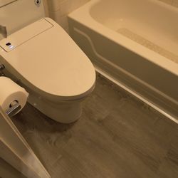 William Remodeling Service - After flooring, commode installed.