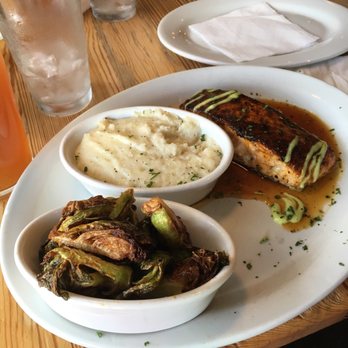 Jonah's Fish & Grits - White cheddar grits, Brussel sprouts, salmon - Seafood Near Me - Thomasville, Georgia