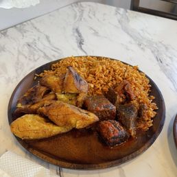 Beef with jollof rice and plantain Beef with jollof rice and plantain