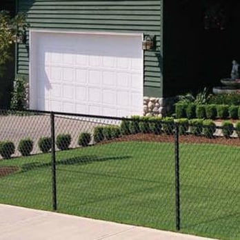 Abacus Landscaping - a green house with a white garage - Landscaping Near Me - Calgary, Alberta Abacus Landscaping - a green house with a white garage - Landscaping Near Me - Calgary, Alberta