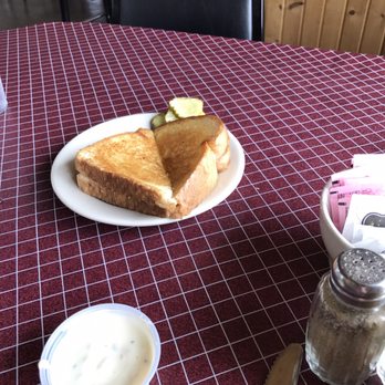 Maggie's Diner - a plate of toast with a pickle on it - American Near Me - Mc Gregor, Iowa