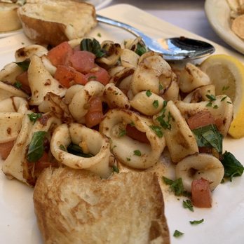 Sangria Y Tapas - Calamari with tomatoes - Tapas Bars Near Me - Westlake, Ohio Sangria Y Tapas - Calamari with tomatoes - Tapas Bars Near Me - Westlake, Ohio