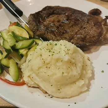 Oceans & Ale - 12 oz. Ribeye with Garlic Mashed Potatoes and Mixed Vegetables - Seafood Near Me - Williamsburg, Virginia Oceans & Ale - 12 oz. Ribeye with Garlic Mashed Potatoes and Mixed Vegetables - Seafood Near Me - Williamsburg, Virginia
