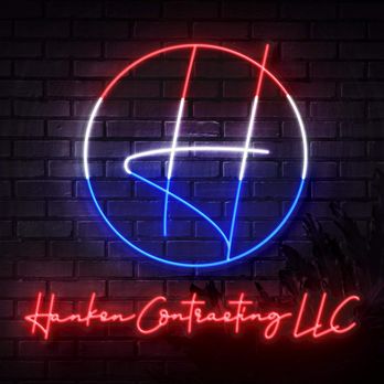 Hanken Contracting - a neon sign on a brick wall - Flooring Near Me Hanken Contracting - a neon sign on a brick wall - Flooring Near Me