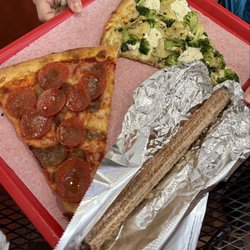 Mateo’s Pizza - This is the white pizza with broccoli and artichoke and the pepperoni and sausage pizza and a Cajeta filled churro.