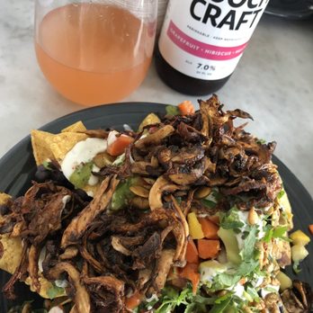 Cafe Gratitude - Nachos with mushroom carnitas. - Vegan Near Me - Venice, California Cafe Gratitude - Nachos with mushroom carnitas. - Vegan Near Me - Venice, California