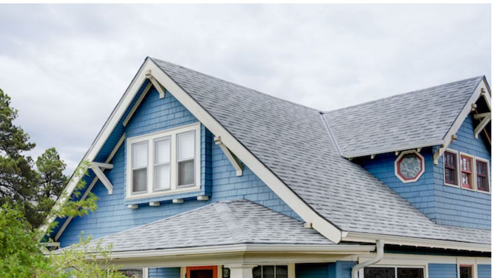 Slide of Espino Roofing