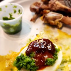 Nankar Peru - Egg with the green spicy salsa and BBQ sauce