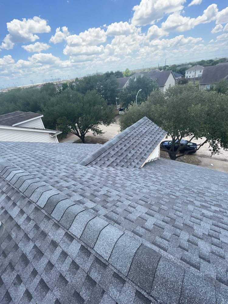 Slide of Rapid Roofing and Construction
