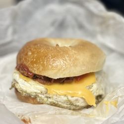 D&D Dogs - Bacon, fried egg and cheddar on a bagel. Yum!