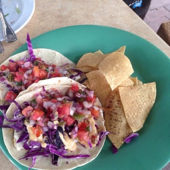 Key Largo Conch House - Mahi Mahi Fish Tacos. Fish is so flaky and just delicious. Chips are great for scooping the salsa that falls out - Seafood Near Me - Key Largo, Florida Key Largo Conch House - Mahi Mahi Fish Tacos. Fish is so flaky and just delicious. Chips are great for scooping the salsa that falls out - Seafood Near Me - Key Largo, Florida
