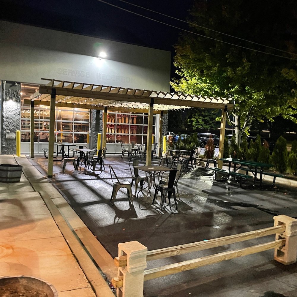 More Brewing - Outdoor seating. Also garage doors to open up for the indoor seating. They also have overhang outdoor seating. - Breweries Near Me - Huntley, Illinois More Brewing - Outdoor seating. Also garage doors to open up for the indoor seating. They also have overhang outdoor seating. - Breweries Near Me - Huntley, Illinois