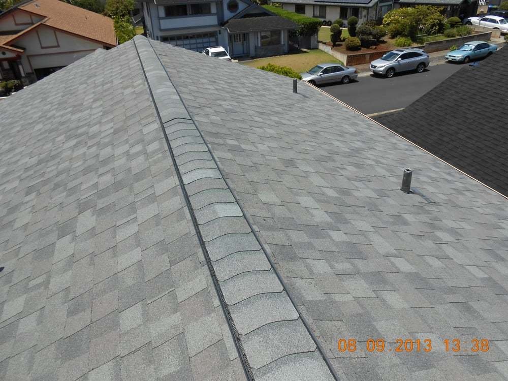 Slide of R.S. Toyama Roofing Service