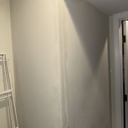 Crossroads Supply - The damage to the ceiling and the walls in the basement.