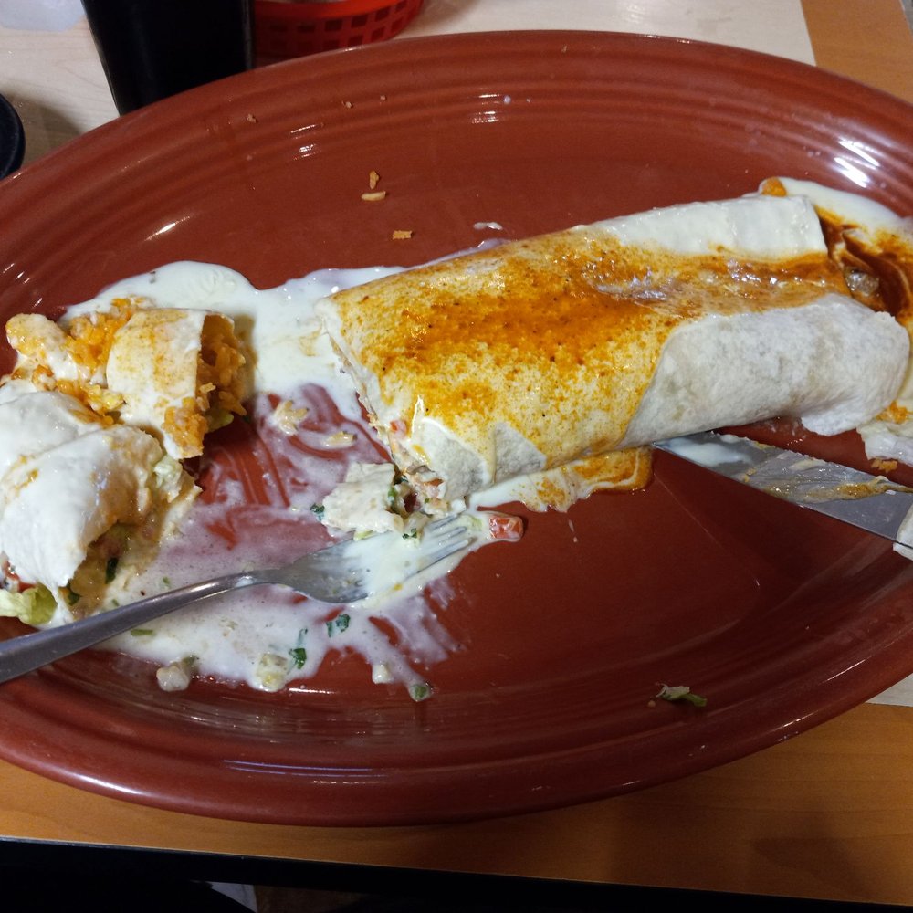 Senor Pancho's - XXL Burito with chicken and steak. 14 inches long! Covered in their delicious cheese sauce and red sauce. - Mexican Near Me - Louisville, Ohio Senor Pancho's - XXL Burito with chicken and steak. 14 inches long! Covered in their delicious cheese sauce and red sauce. - Mexican Near Me - Louisville, Ohio