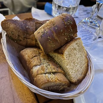 La Maison Grecque - a basket of bread on a table - Greek Near Me - Montreal, Quebec