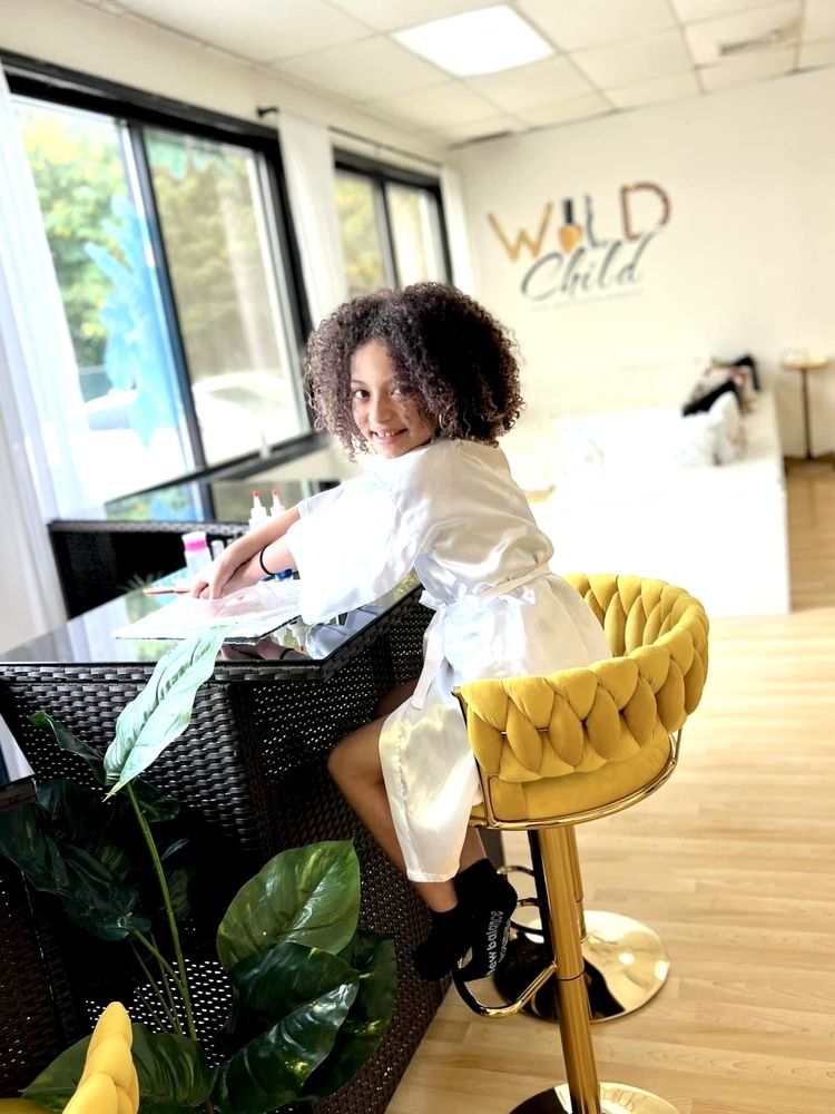 Wild Child Spa Entertainment Logo