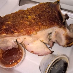 New Century Grocery and Food - Roasted pork by the pound. They will chop it up but I wanted to keep mine whole.