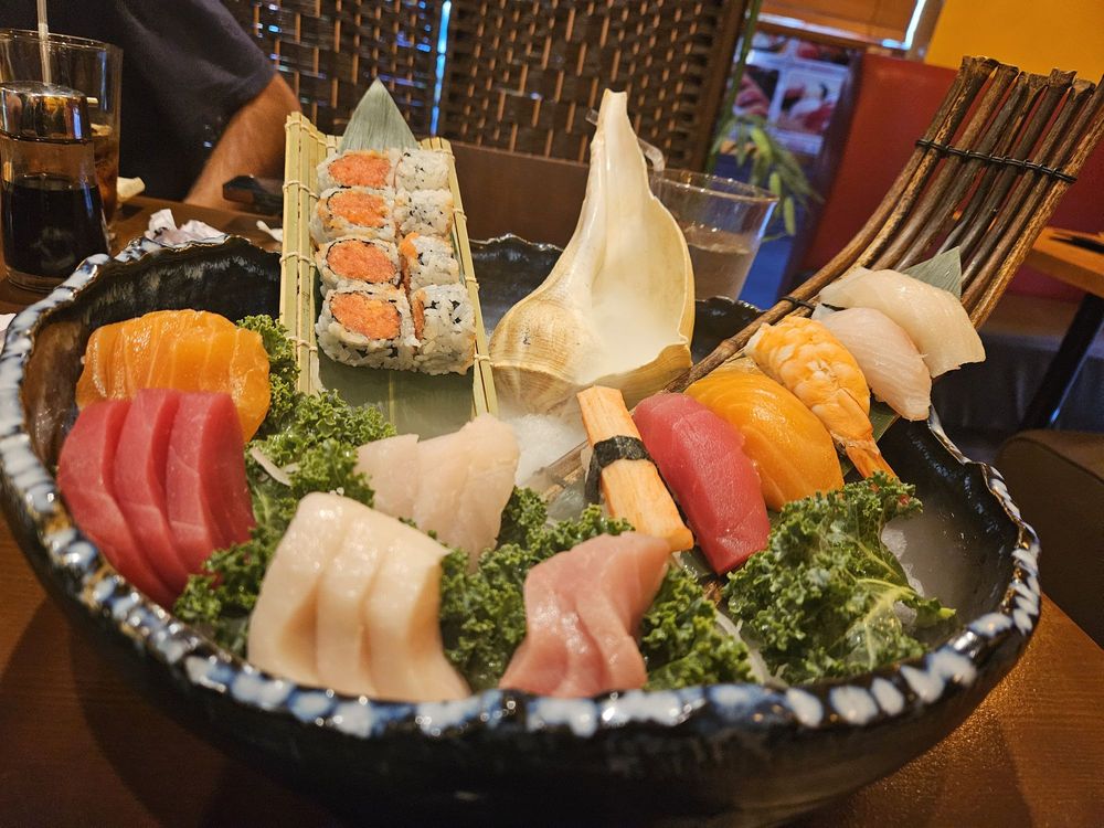 Sushi 99 Logo