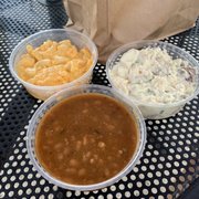 Photo of The Pig’s Gig BBQ - San Diego, CA, United States. Creamy Mac-N-Cheese, Bourbon Baked Beans, and Potato Salad