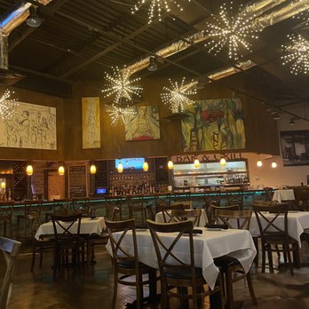 Art Basil Restaurant - tables and chairs with white tablecloths - Bars Near Me - Manalapan, Florida Art Basil Restaurant - tables and chairs with white tablecloths - Bars Near Me - Manalapan, Florida