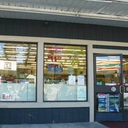 7-Eleven - The sign in the window reads: "BUD FAMILY 18-PACK" ... family packs of beer? Crestline!