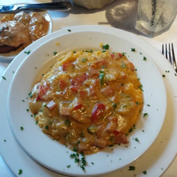 Weidmann's Restaurant - Shrimp and grits.... with the 1870 sauce. - Steakhouses Near Me - Meridian, Mississippi