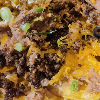 Cafe Santa Rosa - This is the second layer of toppings under the first layer!! They layer the homemade nachos with toppings all the way down. Amazing! - American Near Me - Tucson, Arizona Cafe Santa Rosa - This is the second layer of toppings under the first layer!! They layer the homemade nachos with toppings all the way down. Amazing! - American Near Me - Tucson, Arizona