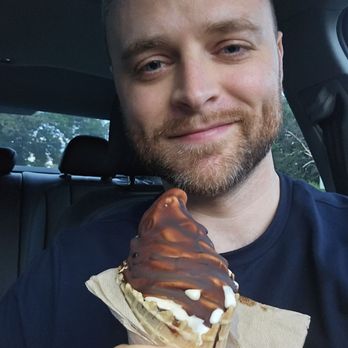Like No Udder - Pistachio Soft Serve in a waffle cone with chocolate magic shell - Food Trucks Near Me - Providence, Rhode Island