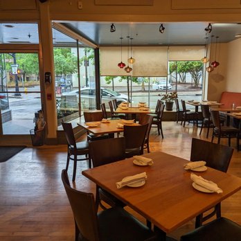 Sitti - a restaurant with tables and chairs - Lebanese Near Me - Raleigh, North Carolina Sitti - a restaurant with tables and chairs - Lebanese Near Me - Raleigh, North Carolina
