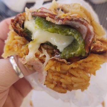 Sonora Grill - Inside the burrito with a bacon wrapped chili relleno - Mexican Near Me - Moreno Valley, California Sonora Grill - Inside the burrito with a bacon wrapped chili relleno - Mexican Near Me - Moreno Valley, California