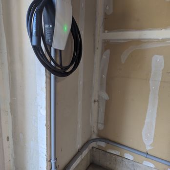 Omega-1 Home Repair - Nicely installed Tesla car charger - on 60 amp breaker. - Heating & Air Conditioning/HVAC Near Me Omega-1 Home Repair - Nicely installed Tesla car charger - on 60 amp breaker. - Heating & Air Conditioning/HVAC Near Me