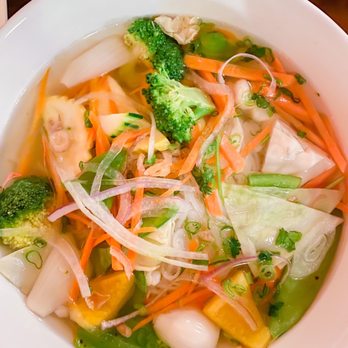 Pho Shobu - a bowl of vegetable soup with chopsticks - Vietnamese Near Me - West Des Moines, Iowa Pho Shobu - a bowl of vegetable soup with chopsticks - Vietnamese Near Me - West Des Moines, Iowa
